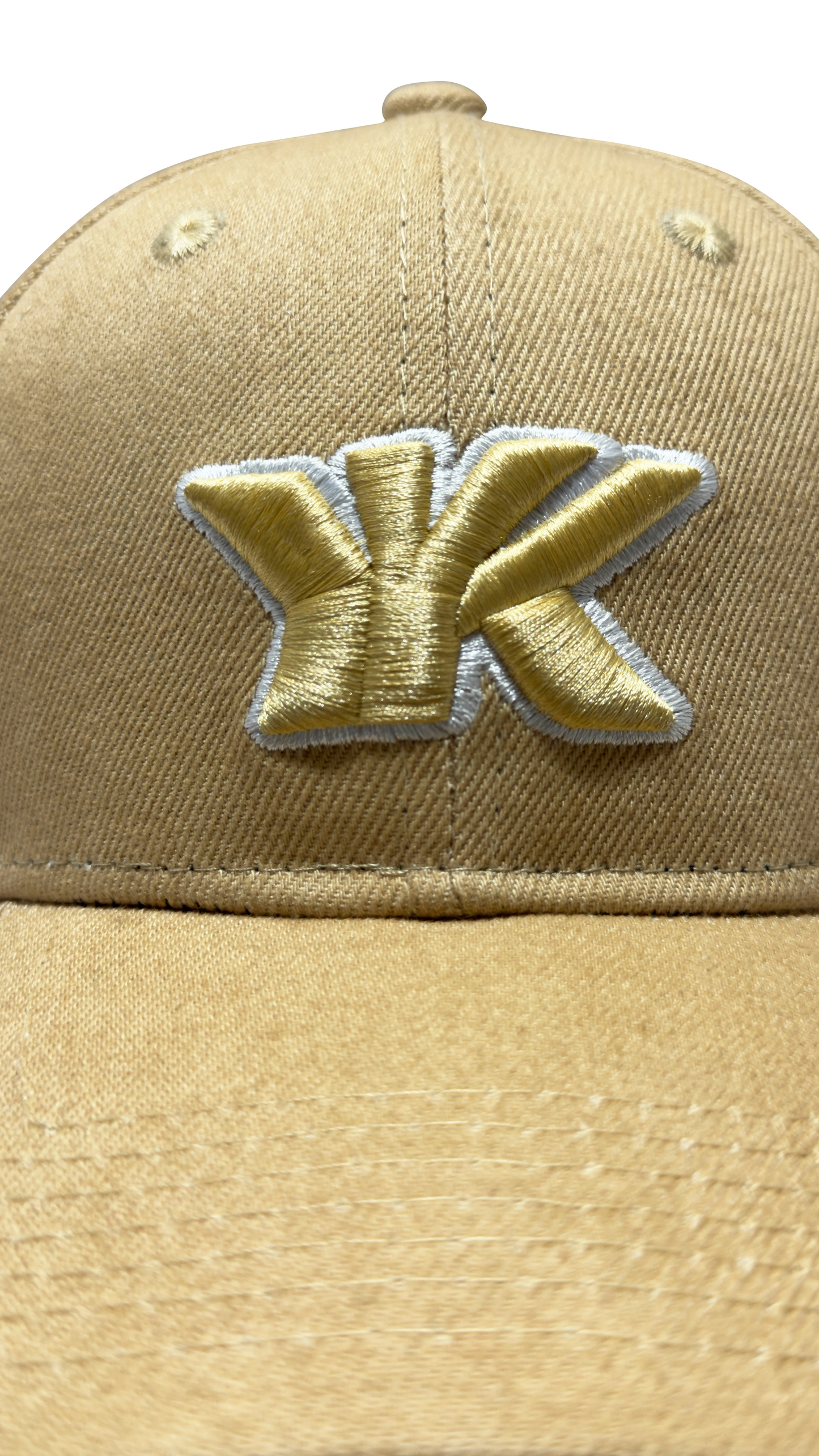Sand beige baseball cap embroidered logo close-up premium stitching
